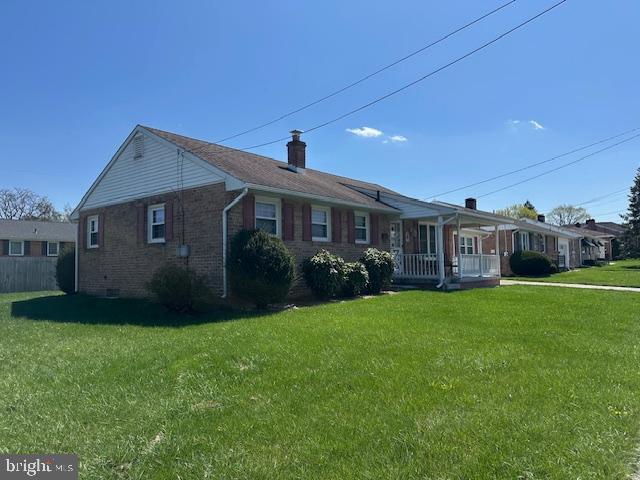 355 George Street Hanover, PA 17331 - Photo 3 of 44 a front view of a house with garden