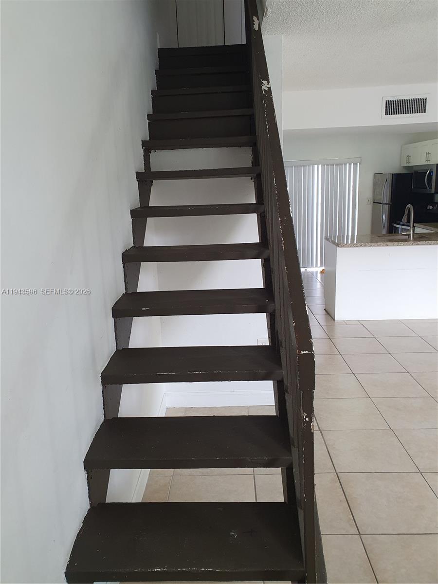 1921 Southwest 107th Avenue, Unit 504 Miami, FL 33165 - Photo 14 of 21 Stair