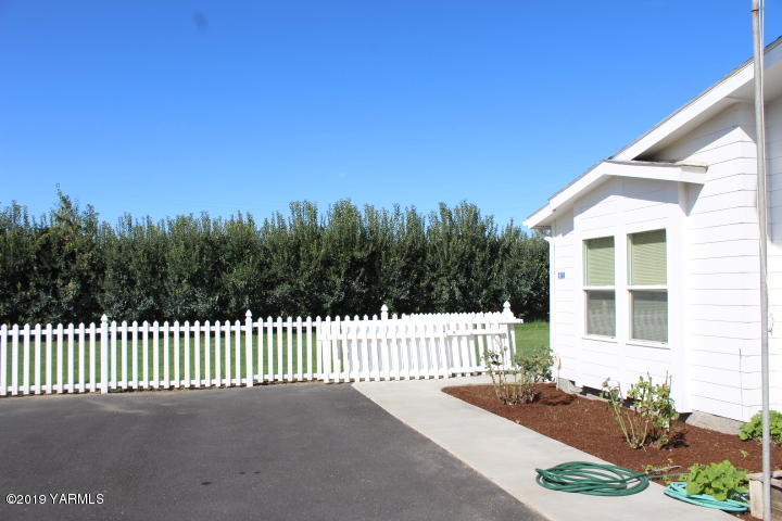 875 Division Road Zillah, WA 98953 - Photo 3 of 38 a view of a house with a street