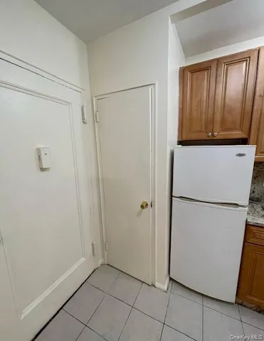 a view of a storage & utility room with washer dryer