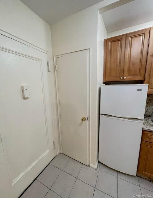 776 Bronx River Road, Unit B24 Bronxville, NY 10708 - Photo 8 of 10 a view of a storage & utility room with washer dryer
