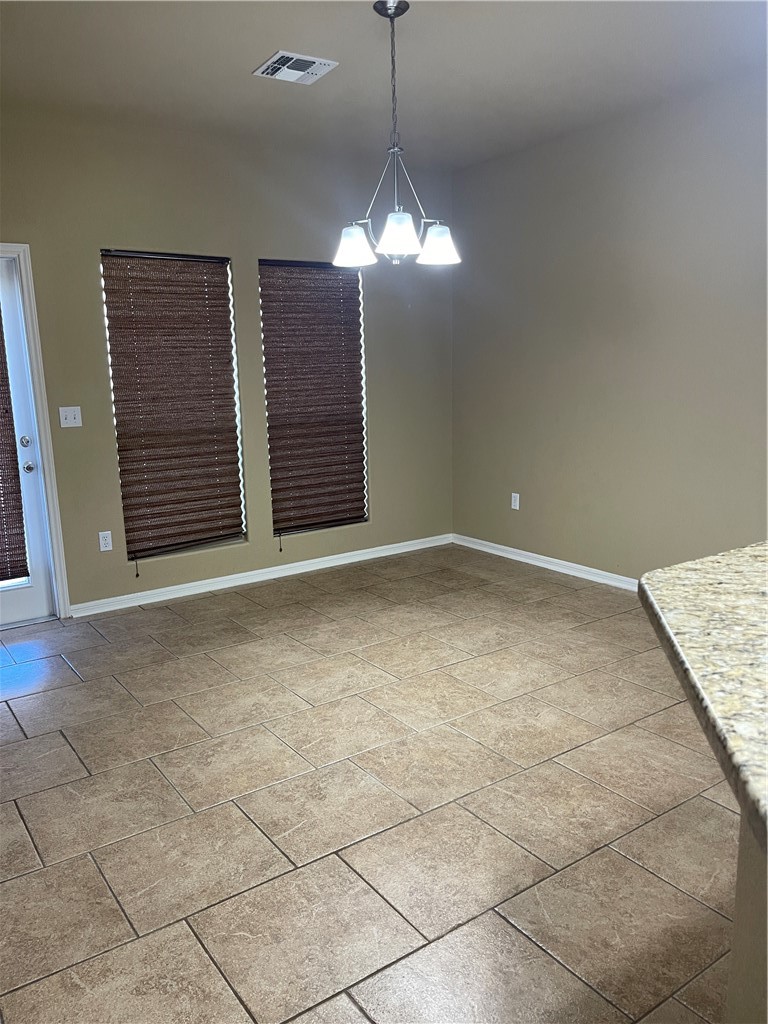 320 San Jose Street Portland, TX 78374 - Photo 13 of 23 a view of a livingroom with a chandelier fan and a window