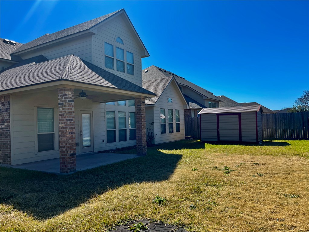 320 San Jose Street Portland, TX 78374 - Photo 5 of 23 a front view of a house with garden