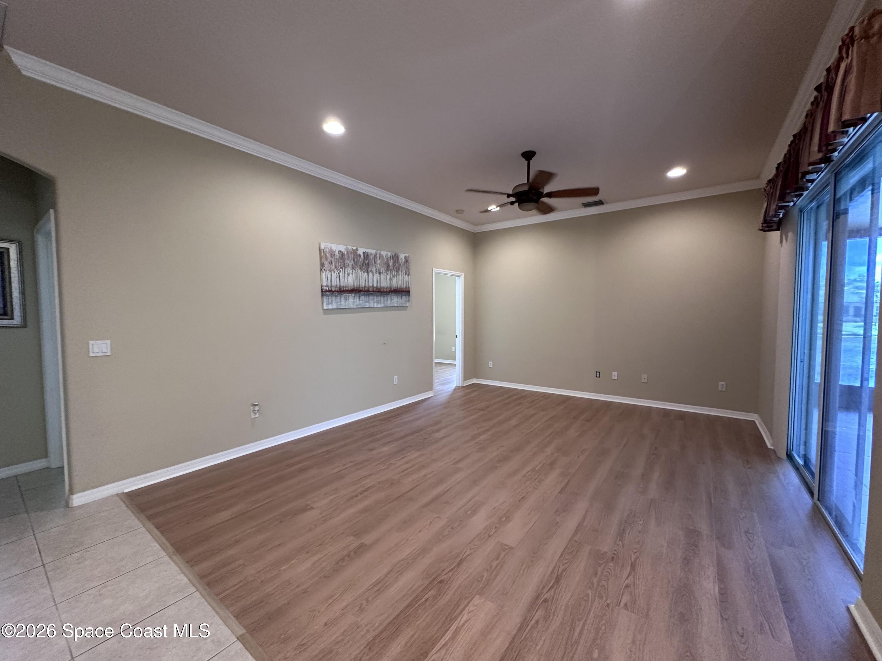 883 Spring Oak Drive Melbourne, FL 32901 - Photo 10 of 45 a view of an empty room with a window