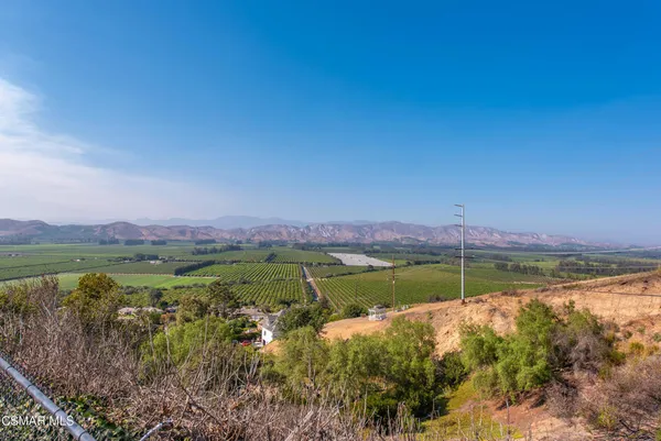 a view of a lake with a mountain in the background