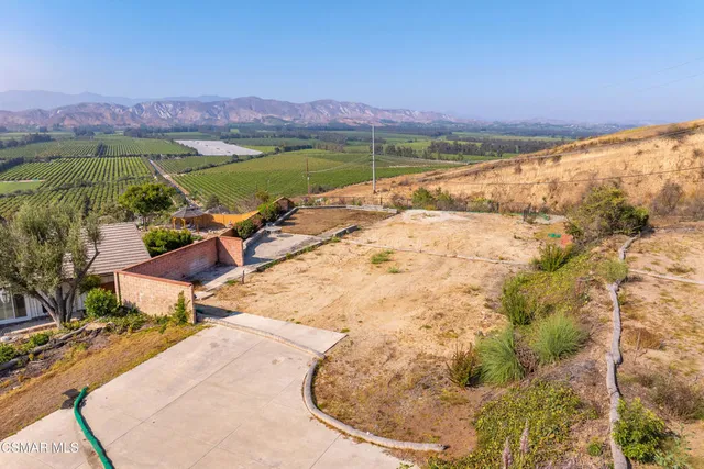 a view of a lake with a mountain from a lake view