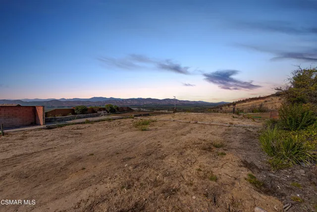 a view of lake with mountain