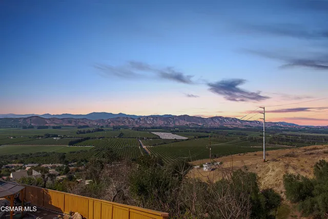 a view of lake and mountain