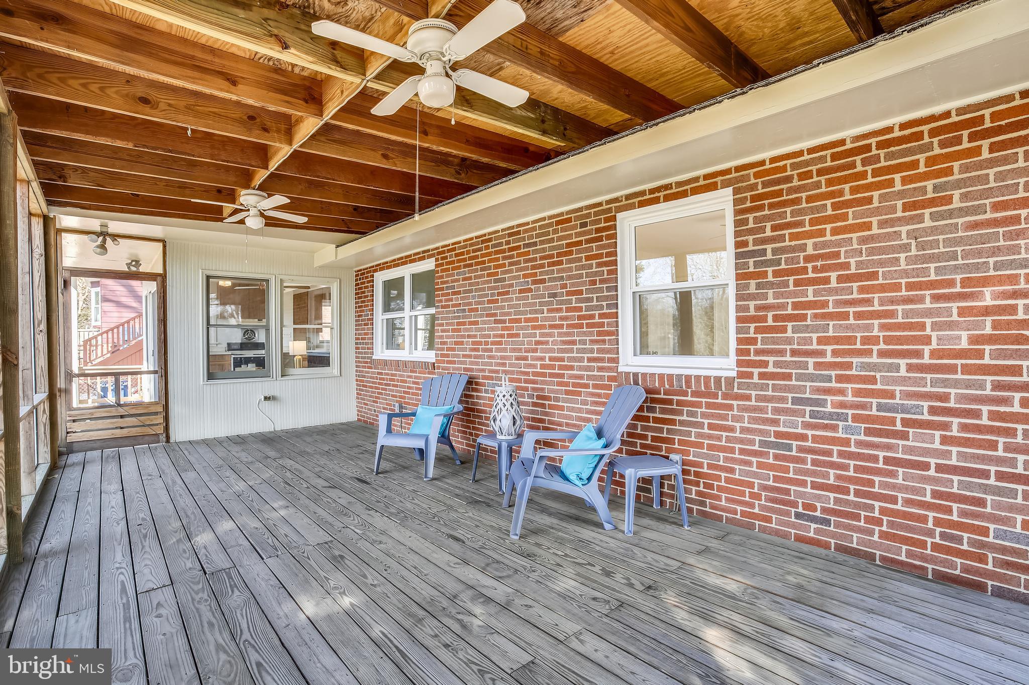 1002 Stirling Road Silver Spring, MD 20901 - Photo 31 of 39 Screen porch has 2 ceiling fans.