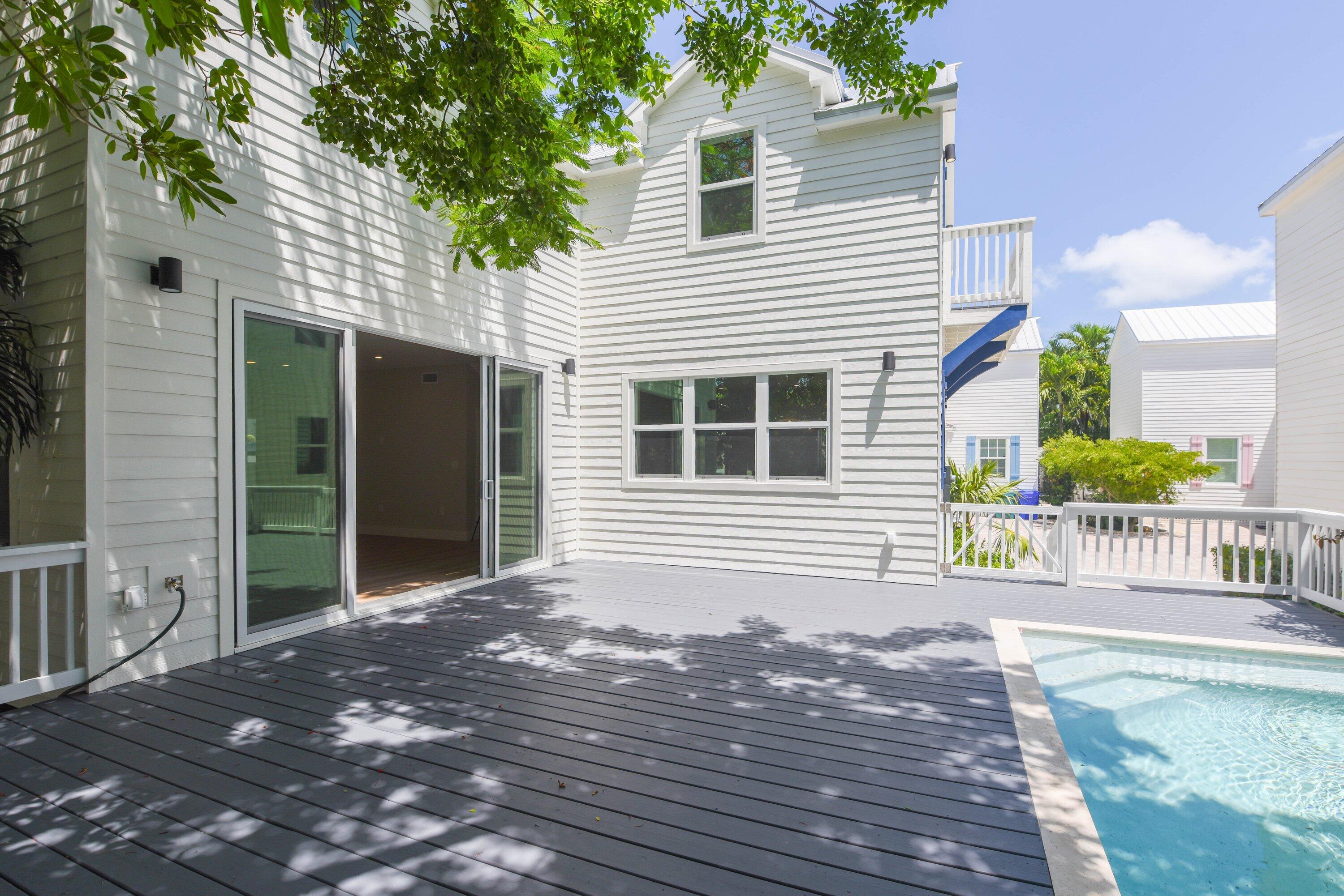 1316 Royal Street, Unit 6 Key West, FL 33040 - Photo 17 of 43 Pool Area with Spacious Decking