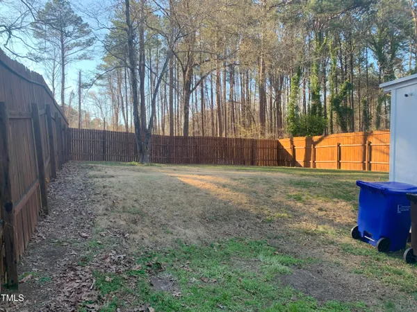 a view of backyard with trees