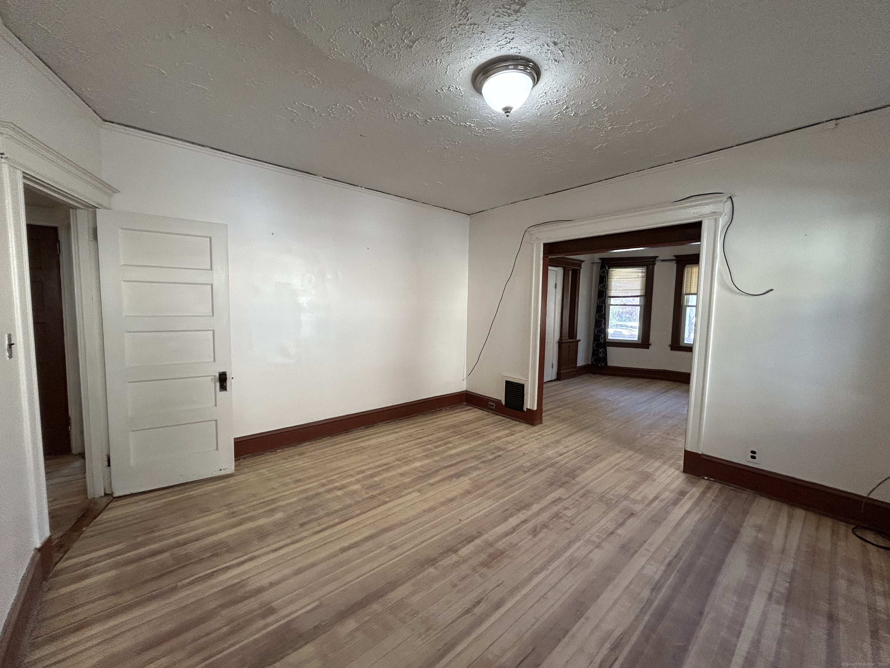 40 Cabot Street Hartford, CT 06112 - Photo 12 of 19 a view of empty room with wooden floor
