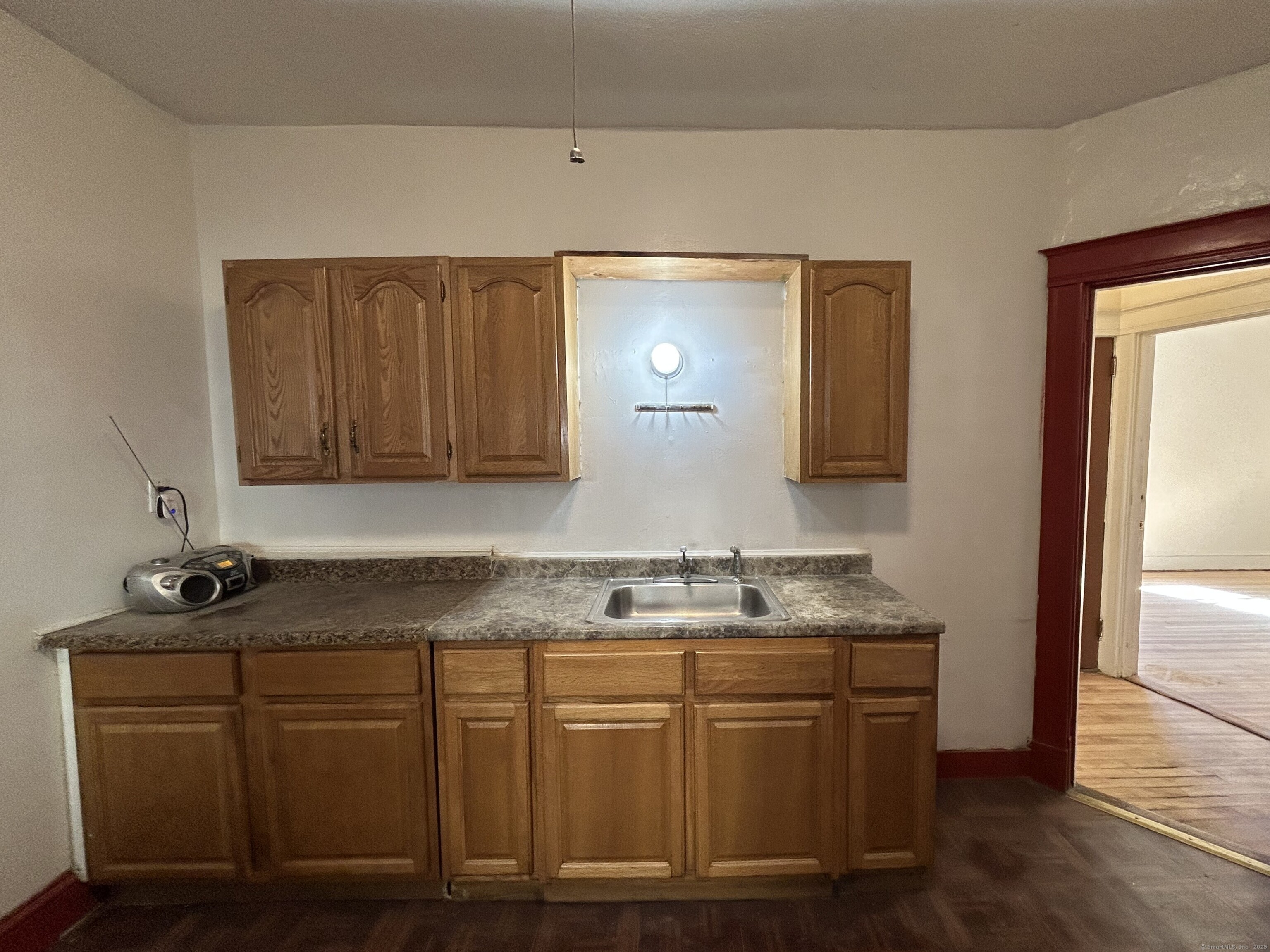 40 Cabot Street Hartford, CT 06112 - Photo 4 of 19 a bathroom with a sink and a mirror