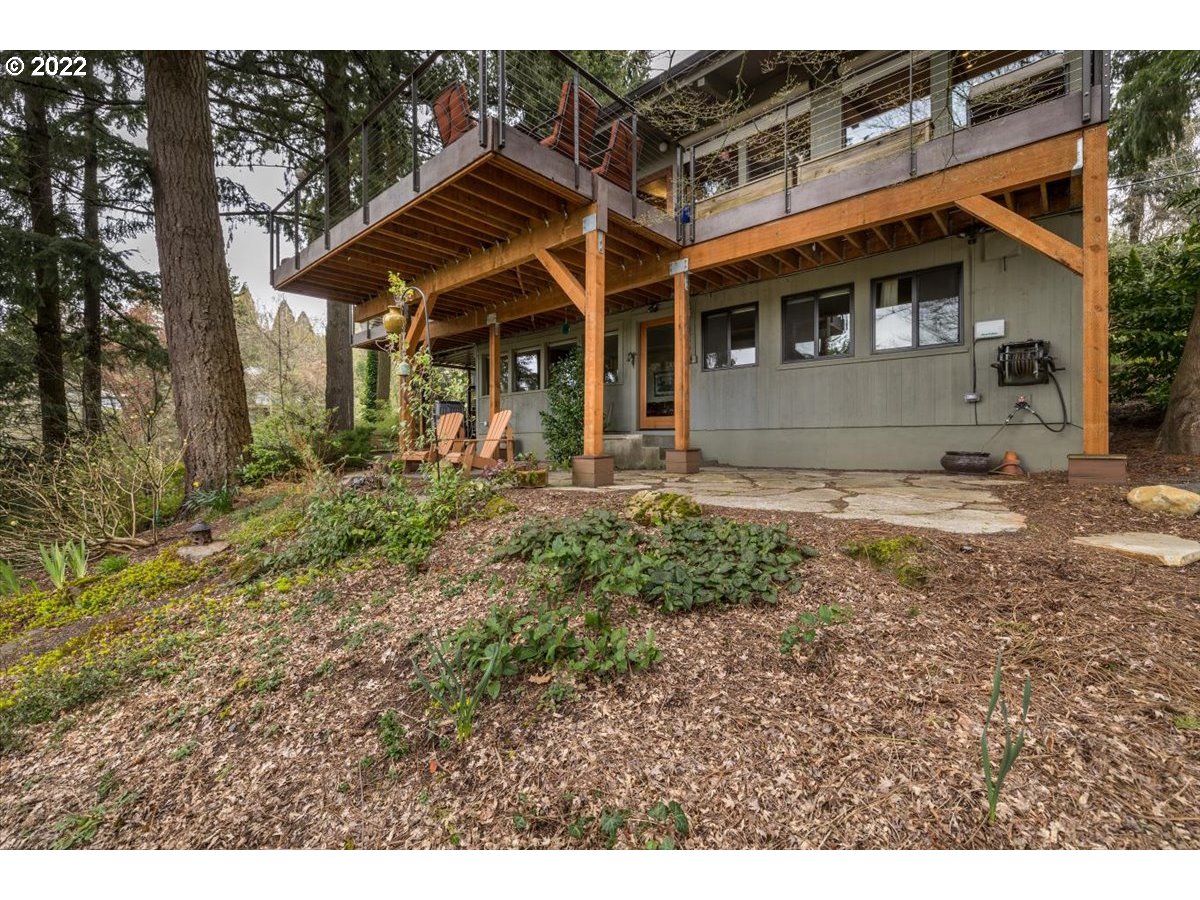 3837 Southwest Dosch Road Portland, OR 97239 - Photo 25 of 32 a view of a house with a yard