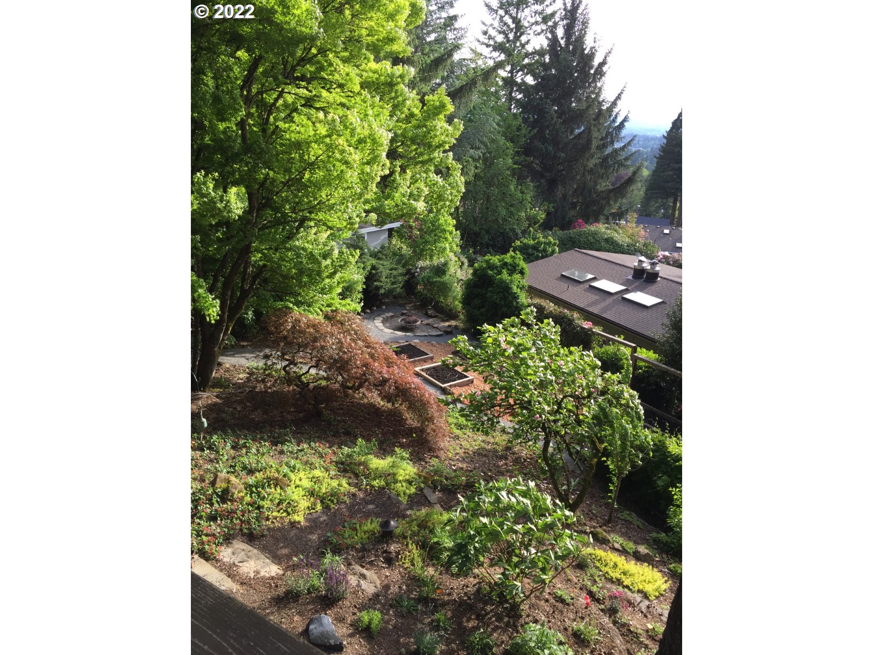 3837 Southwest Dosch Road Portland, OR 97239 - Photo 27 of 32 a backyard of a house with a yard and outdoor seating