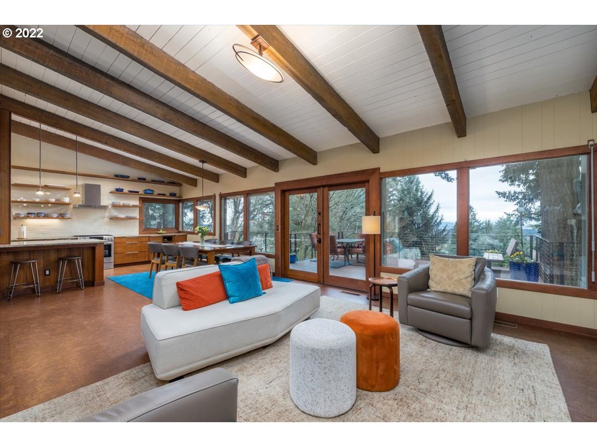 3837 Southwest Dosch Road Portland, OR 97239 - Photo 7 of 32 a living room with furniture and a large window