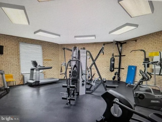 a couple of cars parked in front of a house