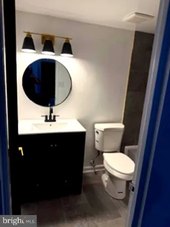 a bathroom with a sink and a toilet