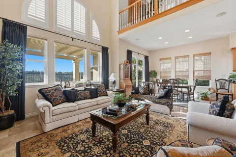a large kitchen with lots of counter space and stainless steel appliances