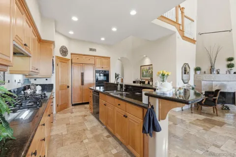 a view of a hallway with closet and a livingroom