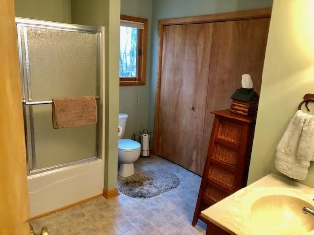 916 2 Mile Road Blanchard, MI 49310 - Photo 8 of 17 Main Fl Bathroom/Laundry