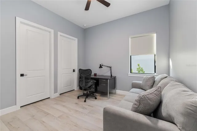 a living room with furniture and a window