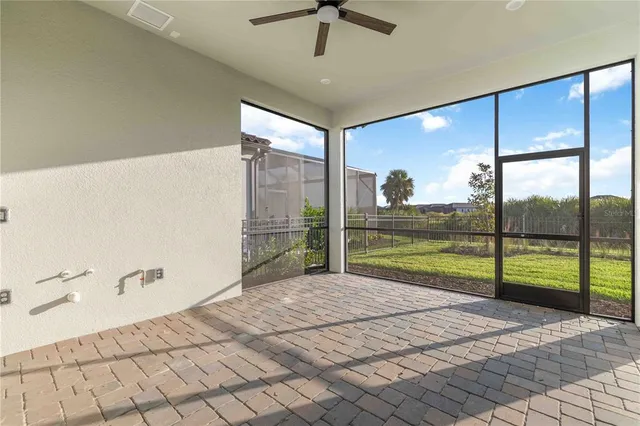 a view of a room with a large window