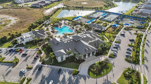 a view of swimming pool with outdoor seating