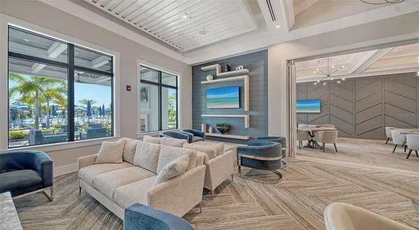 a view of a dining room with furniture window and outside view