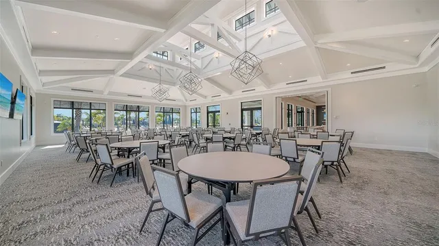 a outdoor space with patio lots of furniture and white walls