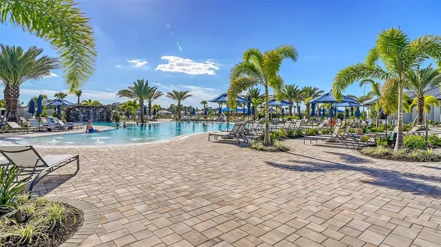 a room with lots of tables and chairs
