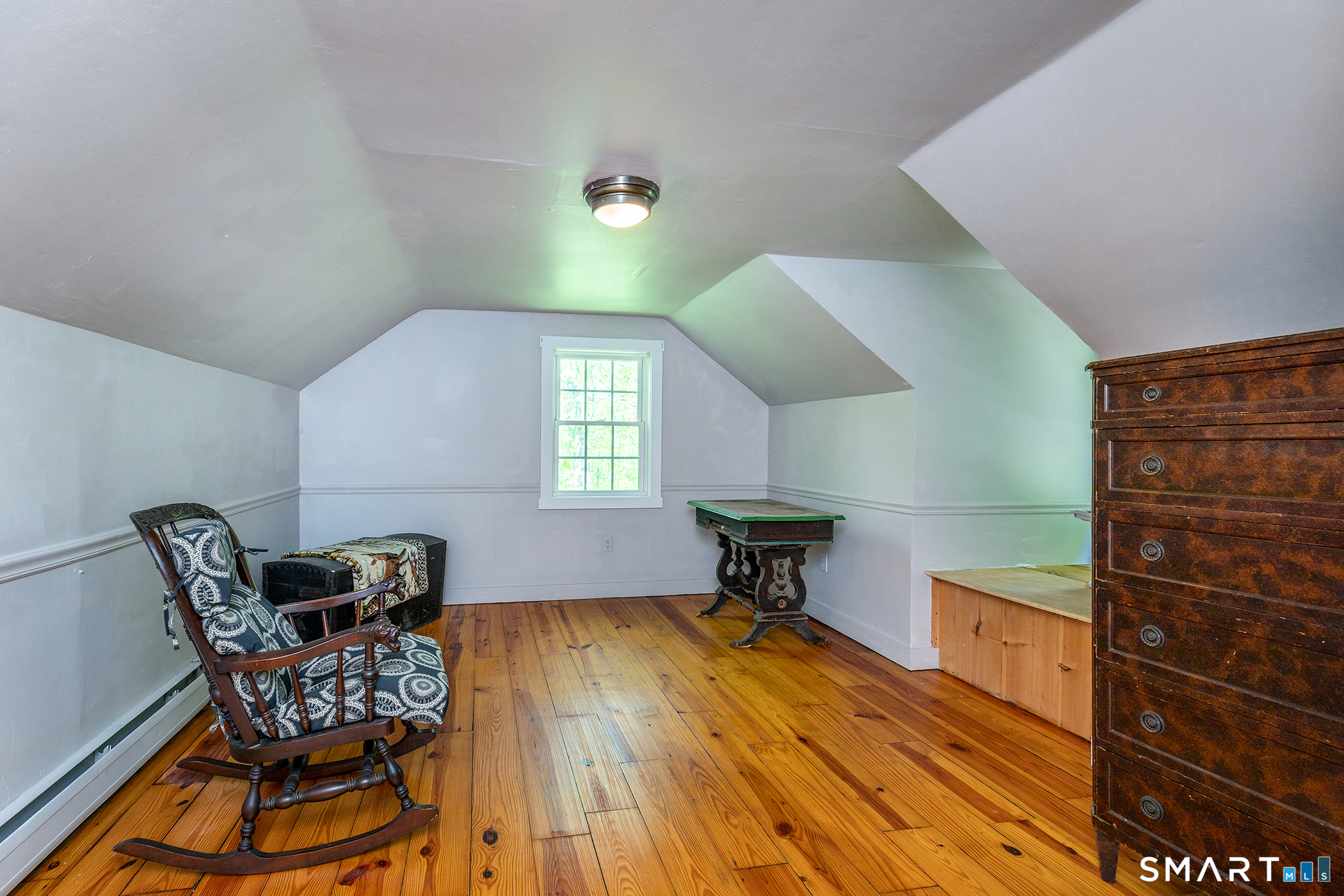 25 Bald Hill Road Kent, CT 06785 - Photo 22 of 38 This exceptionally large third bedroom on the second floor features wide wood floors and offers incredible flexibility, making it the perfect space for a creative studio or a game room.