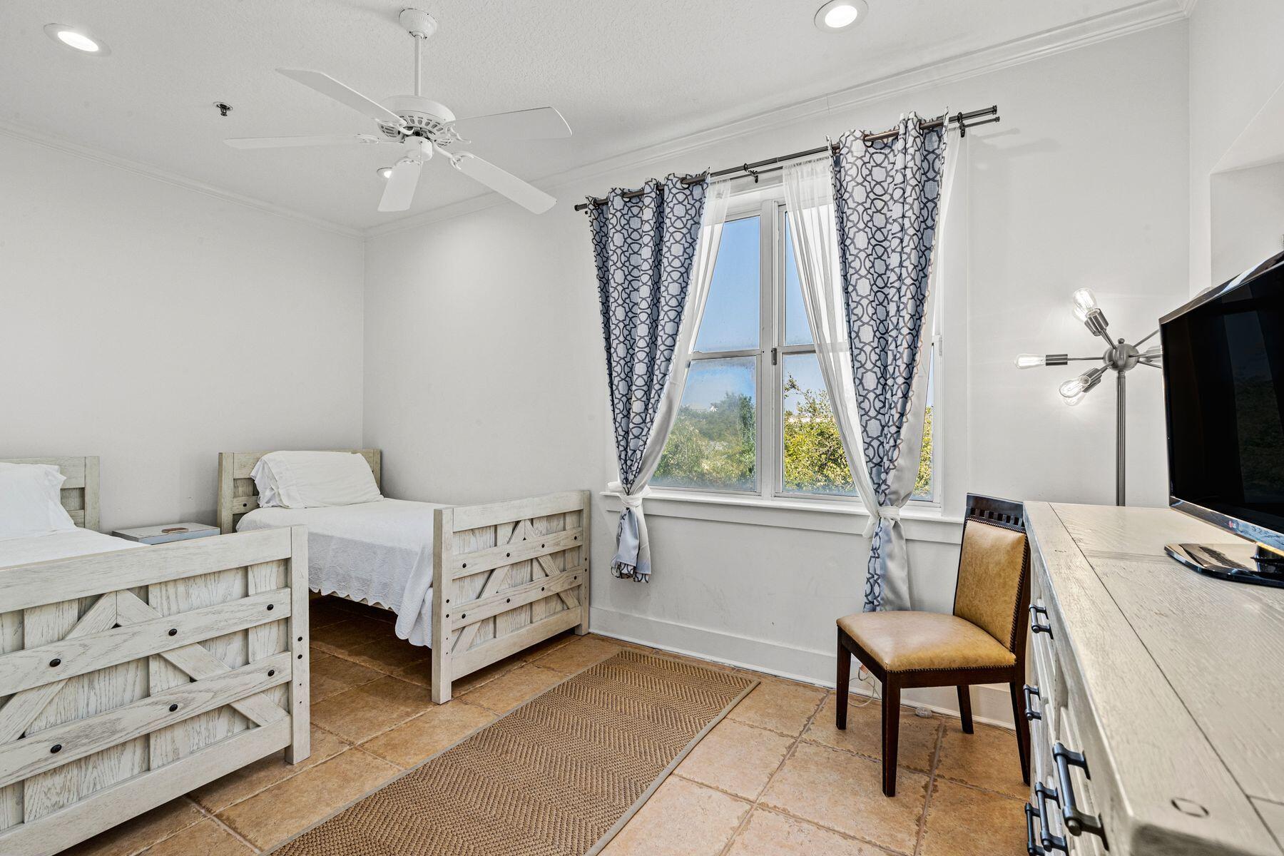 120 Quincy Circle Santa Rosa Beach, FL 32459 - Photo 12 of 26 a bedroom with furniture and a window