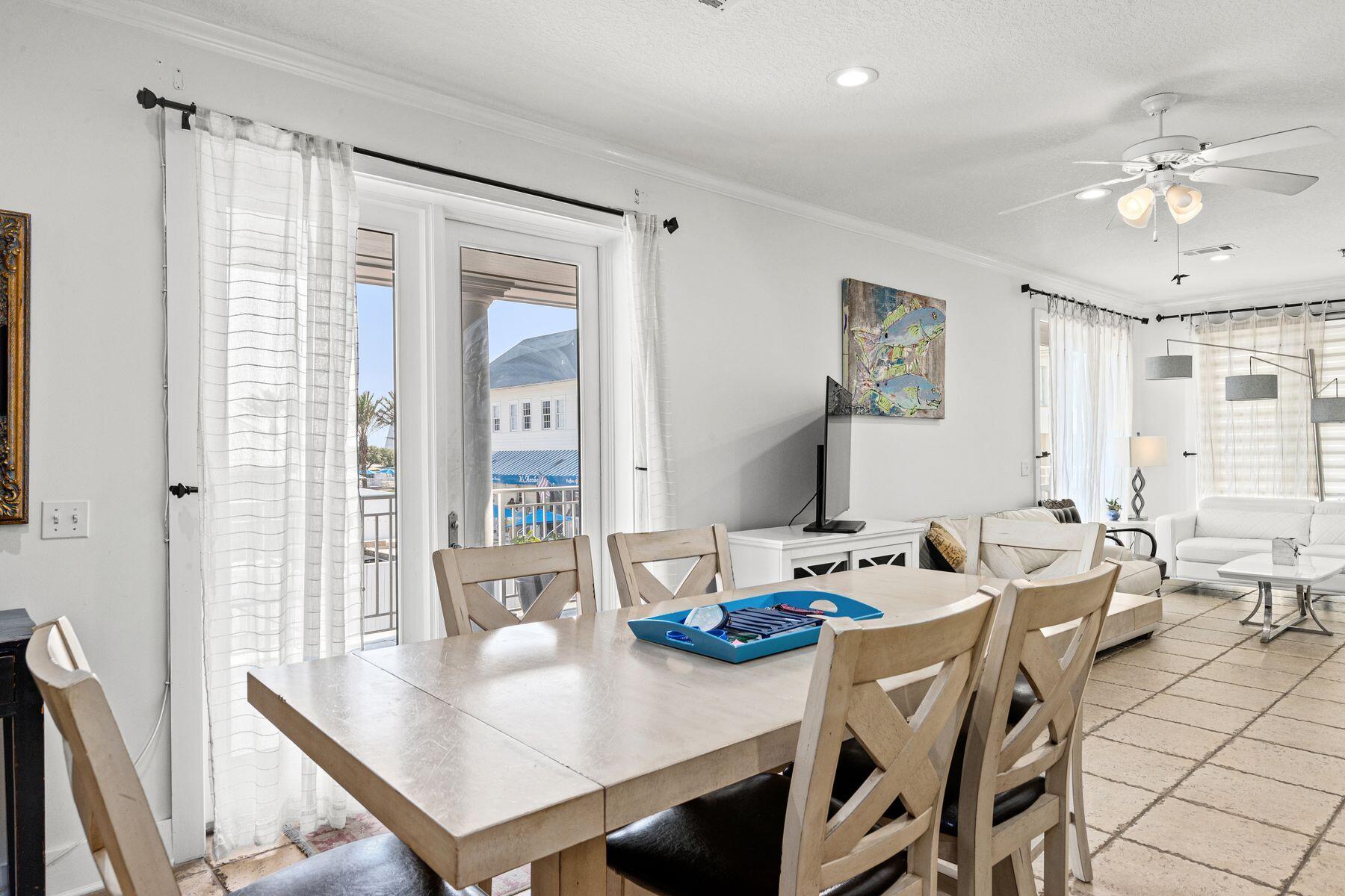 120 Quincy Circle Santa Rosa Beach, FL 32459 - Photo 15 of 26 a view of a dining room with furniture and wooden floor