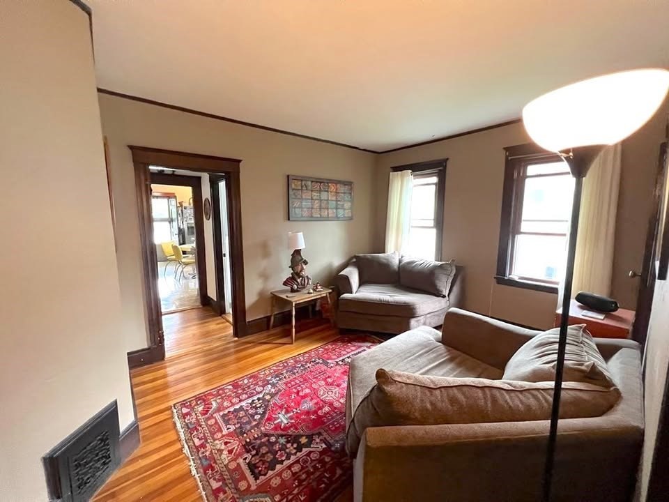 29 Richie Road, Unit 2 Quincy, MA 02169 - Photo 12 of 30 a living room with furniture and a window