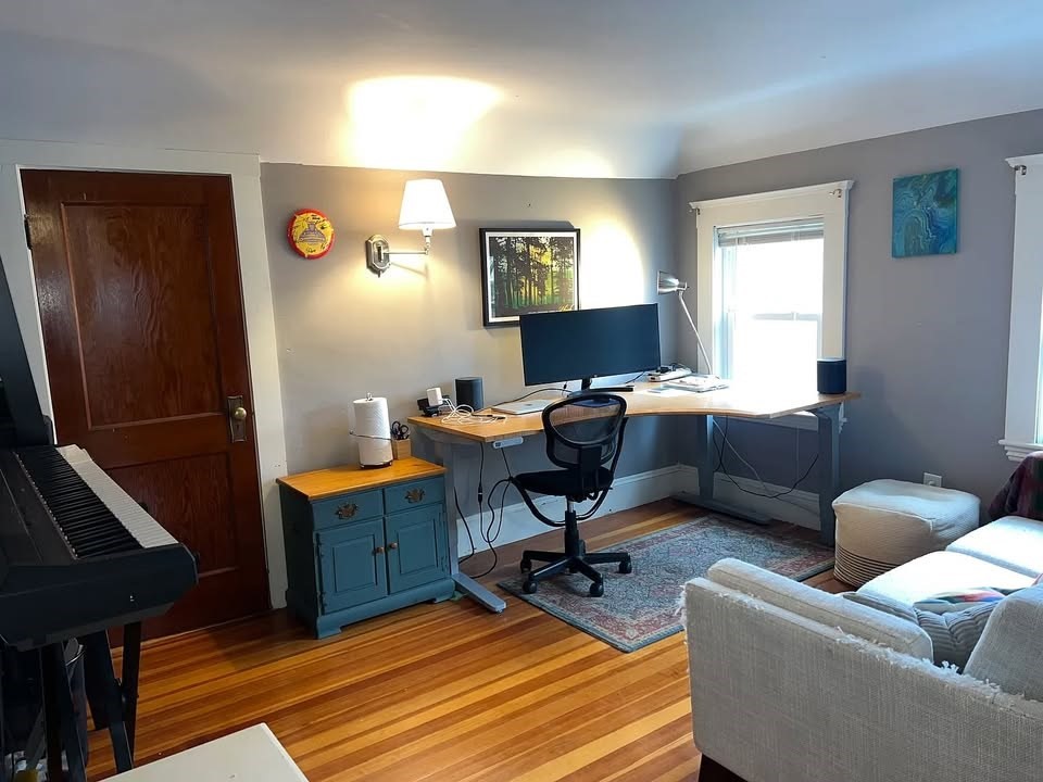 29 Richie Road, Unit 2 Quincy, MA 02169 - Photo 15 of 30 a view of a livingroom with workspace and a window