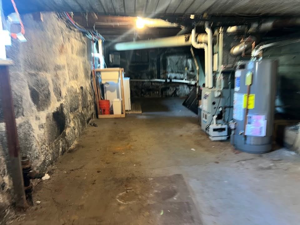 29 Richie Road, Unit 2 Quincy, MA 02169 - Photo 23 of 30 a view of store room with washer and dryer