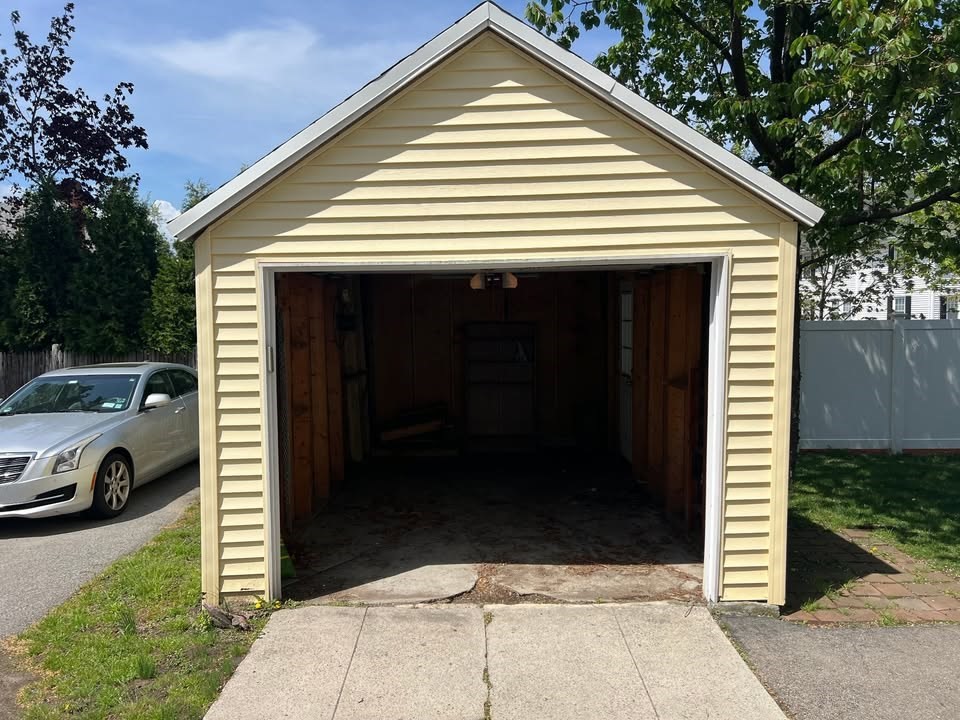 29 Richie Road, Unit 2 Quincy, MA 02169 - Photo 24 of 30 a view of a house with a outdoor space