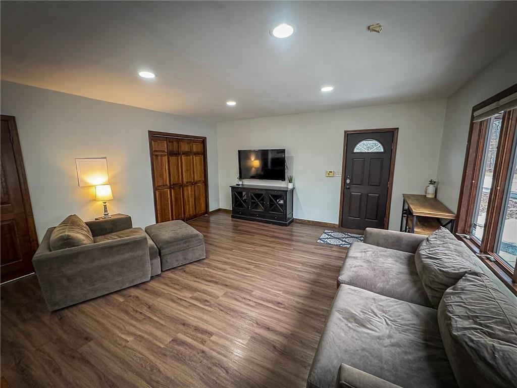 706 Clearfield Road Fenelton, PA 16034 - Photo 11 of 50 a living room with furniture and a flat screen tv
