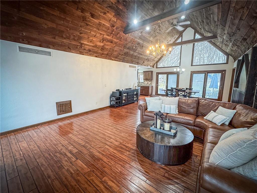 706 Clearfield Road Fenelton, PA 16034 - Photo 18 of 50 a living room with furniture and a chandelier