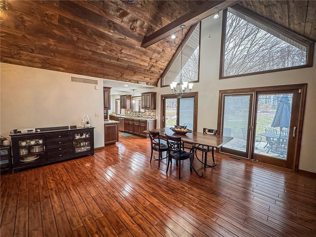 706 Clearfield Road Fenelton, PA 16034 - Photo 22 of 50 a view of a dining room with furniture and wooden floor