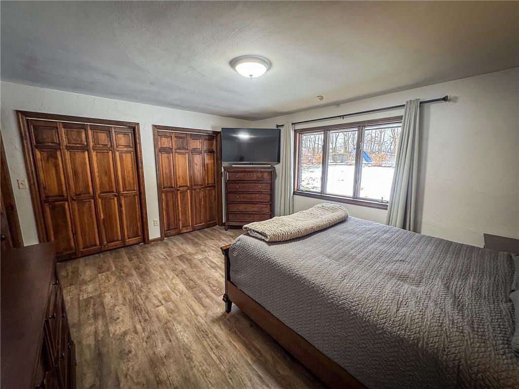 706 Clearfield Road Fenelton, PA 16034 - Photo 26 of 50 a bedroom with a large bed and a dresser