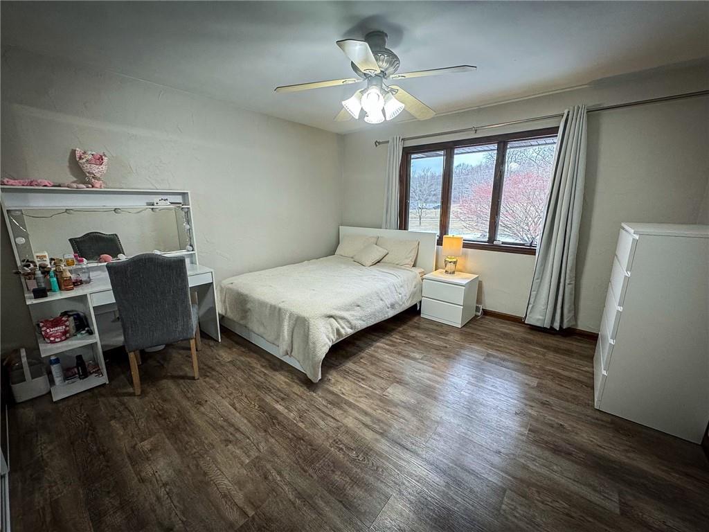 706 Clearfield Road Fenelton, PA 16034 - Photo 30 of 50 a bedroom with a bed and a table in it