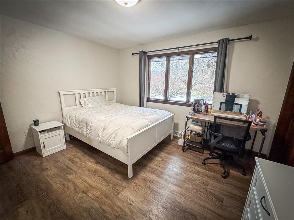 706 Clearfield Road Fenelton, PA 16034 - Photo 33 of 50 a bed room with a bed and a desk