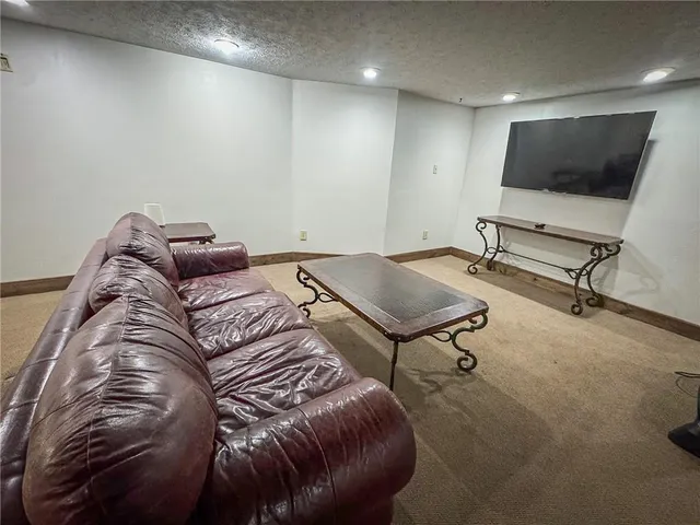 a bedroom with a bed and dresser