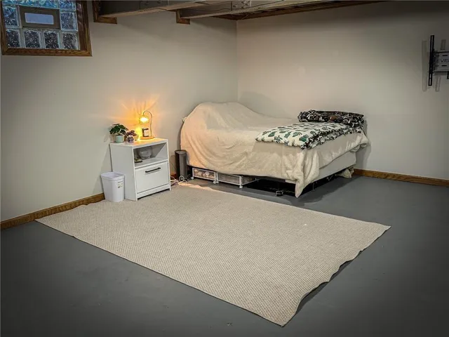 a bed room with a bed and a couch