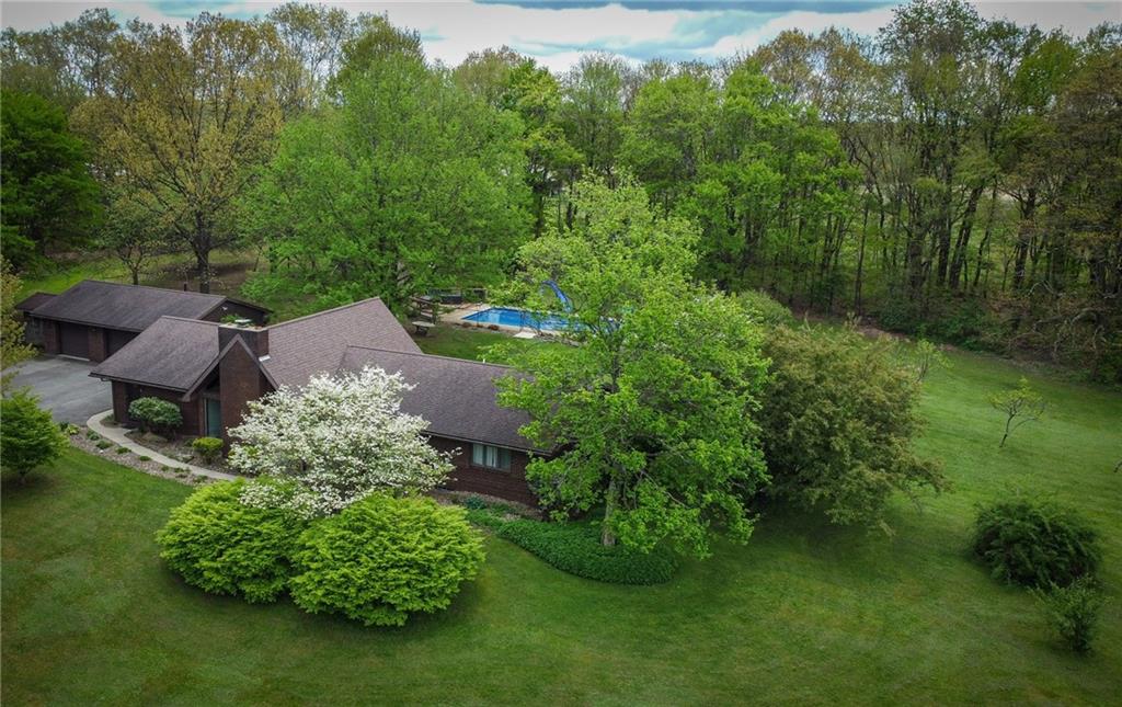 706 Clearfield Road Fenelton, PA 16034 - Photo 41 of 50 an aerial view of a house with a yard