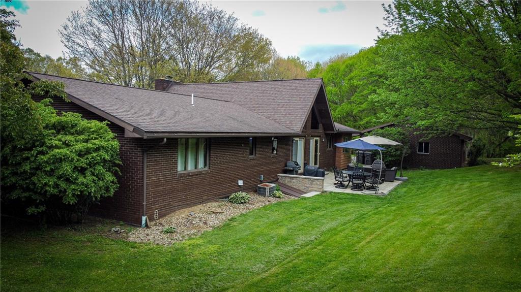 706 Clearfield Road Fenelton, PA 16034 - Photo 43 of 50 a view of a house with backyard porch and sitting area