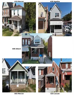 a view of multiple houses with a city street