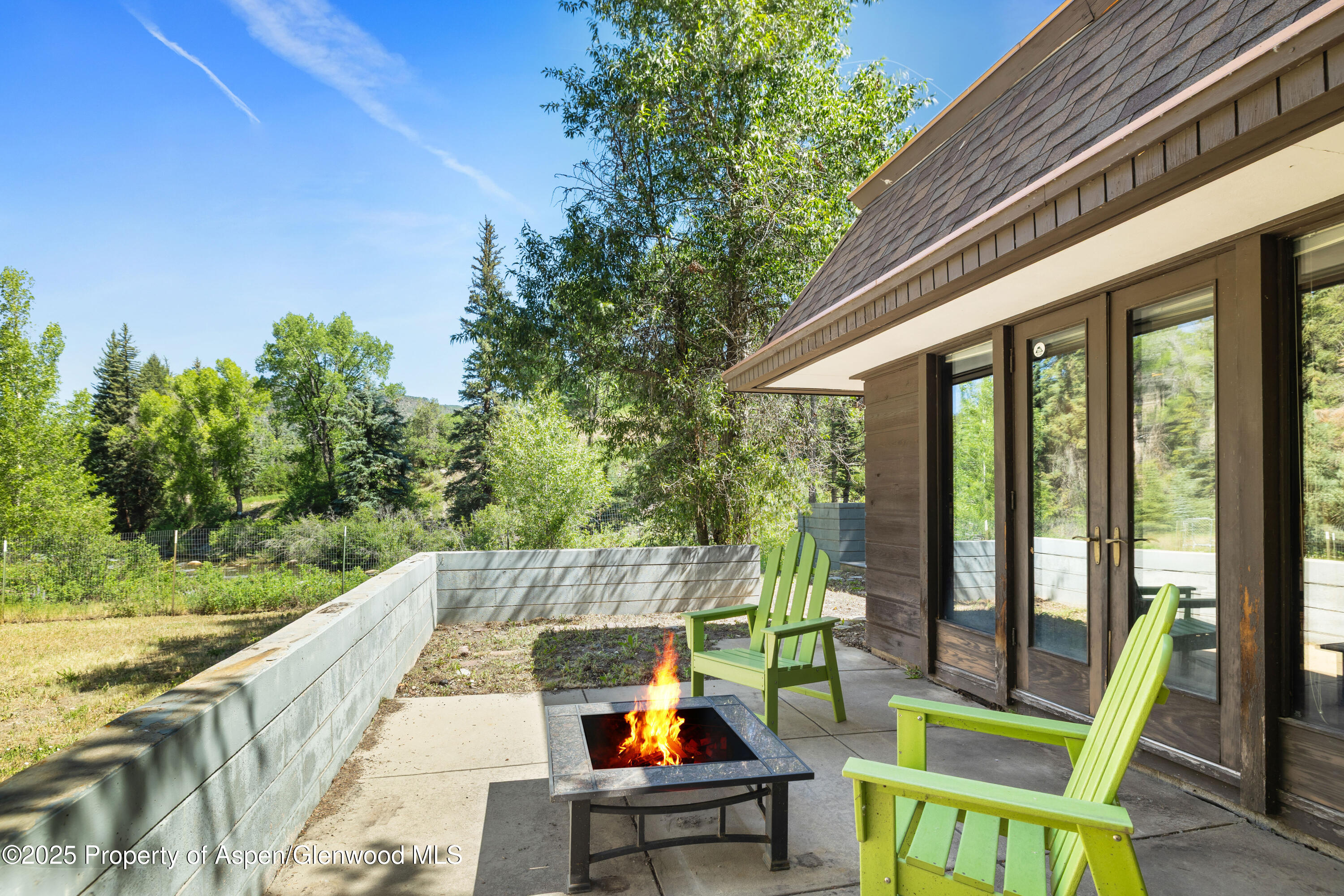 820 Twining Flats Road Aspen, CO 81611 - Photo 15 of 15 a view of deck with furniture and garden